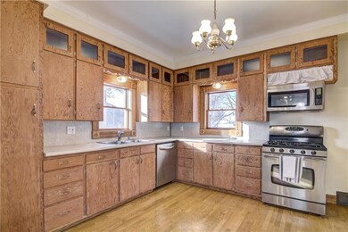 Kitchen has built-in dishwasher and lots of cabine