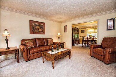 Formal living room has great space and beautiful c