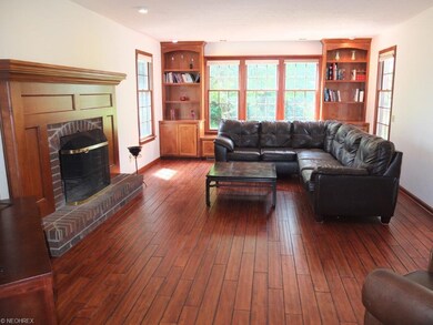 Sunken great room with hardwood floor and beautifu