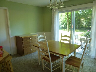 Dining room slider door to fenced yard