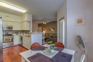 Dining room with light wood-type flooring and a ce
