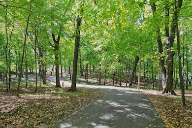 Enjoy your private, wooded entry to the property.