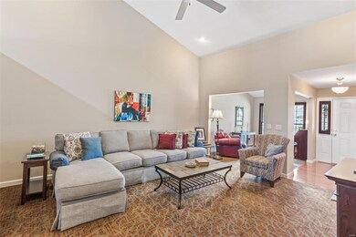 Soaring vaulted ceilings in the main living area make the space feel open and airy!