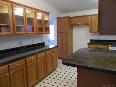 Kitchen has lots of cabinet space