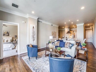 Living and dining area with master suite to the le