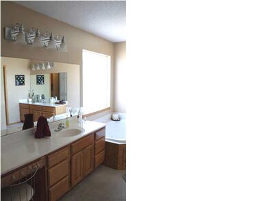 MASTER BATH WITH HIS & HER VANITIES