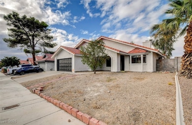 Mediterranean / spanish house featuring a chimney, stucco siding, concrete driveway, a tile roof, and an attached garage