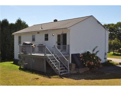 View. Rear view of house with rear deck