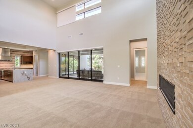 Open floor plan with views of the patio