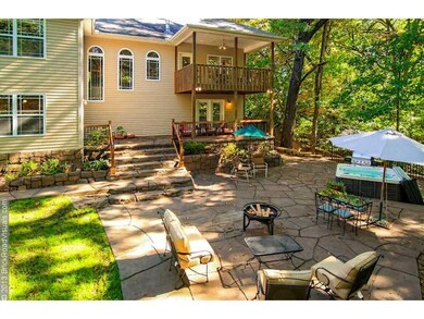 Exterior Back. Stamped concrete entertainment area in the back.