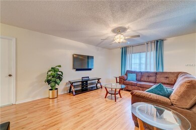 Living room with door to garage.