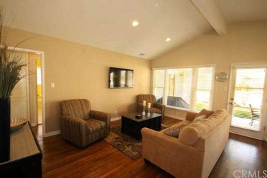 Living room with vaulted ceilings