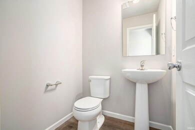 First floor powder room is centrally located and easy for guests to use