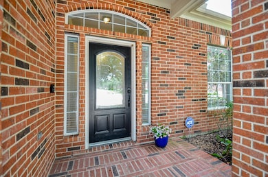 Inviting all brick front porch ... lets go inside!