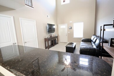 Large Great Room with Granite Kitchen Serving Bar