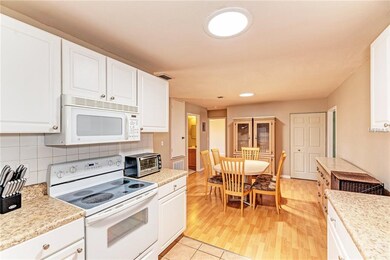 Primary kitchen looking to dining room
