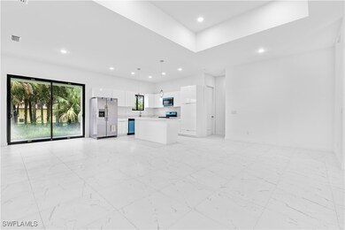 Unfurnished living room with recessed lighting and
