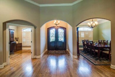 Awesome Entrance Leads Into The Living Room of This Elegant Home