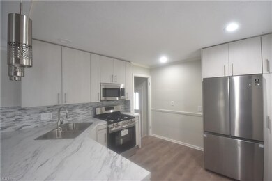 Backsplash and pendant lighting.