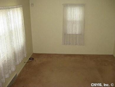 Living Room Living Room Boasts Neutral Carpets & R