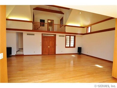 Great Room Staircase leads to the upper Loft Area