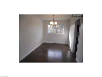 Formal dining room with new hardwood flooring and 