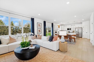 (Photo of a decorated model, actual homes finishes will vary) Cozy up next to the fireplace in your new Great Room!