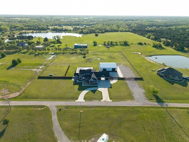 Aerial view with a rural view and a water view