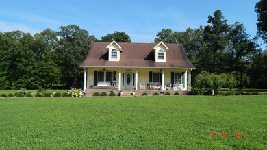 This southern charm home sits on a 1 acre lot, back away from the road. 