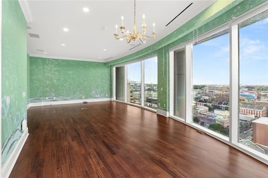 Expansive Primary Suite with wall to wall floor to