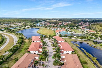 Aerial perspective of suburban area featuring a large body of water