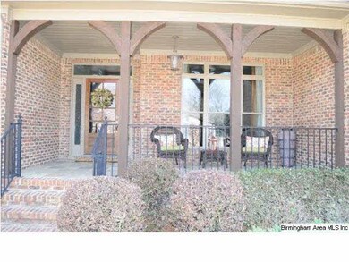 Front porch with cedar accents.