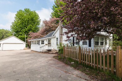 Side of the house, driveway, garage