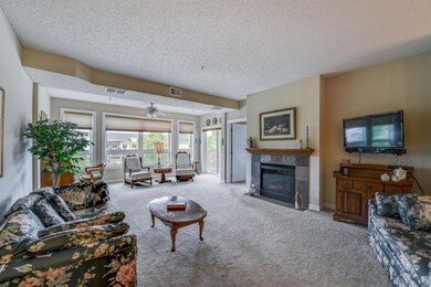 The great room features a handsome, gas fireplace 