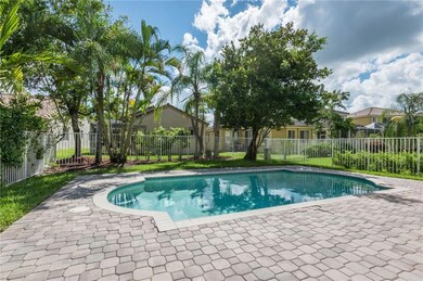 Fenced patio with pool.