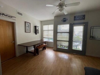 Dining area with wood finished floors and ceiling