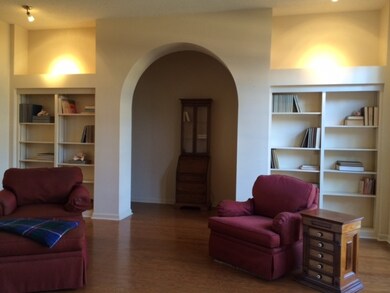 Check out the built ins and the gleaming wood floo