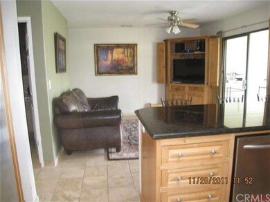 Kitchen overlooks family room.