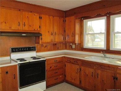 Knotty Pine kitchen cabinets