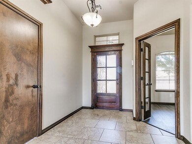 Entrance foyer featuring a healthy amount of natur