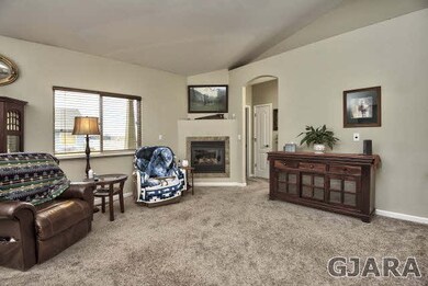You'll find a cozy gas-log fireplace tucked in to 