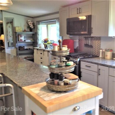 Kitchen Island with Bar, Outlets & additional spac