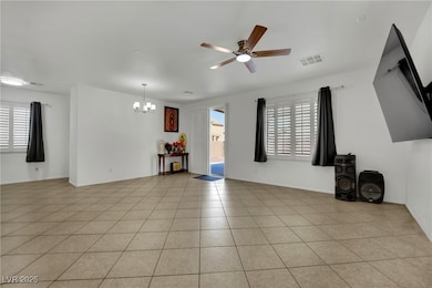 Unfurnished living room with a chandelier, ceiling