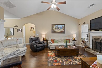 Masonry fireplace in oversized living area.