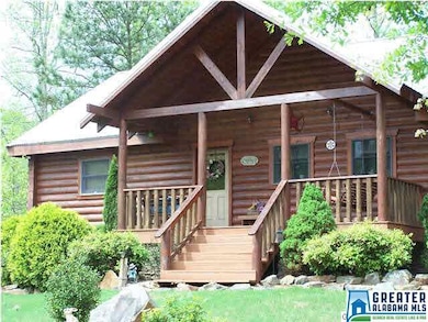 Front with wide steps and front porch swing!