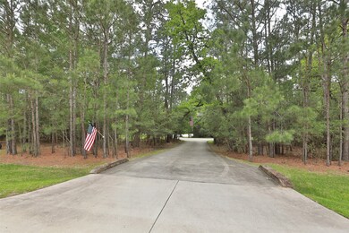 If privacy is what you want, the is the house for you! House is nestled on a wooded lot.