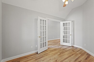 Study w/ French doors & plantation shutters
