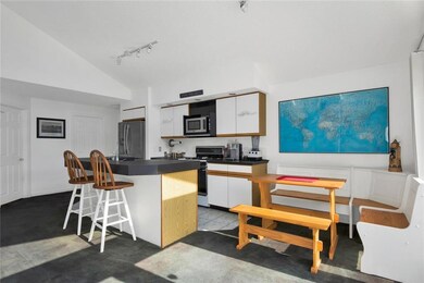 Kitchen with breakfast bar.