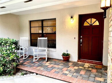Inviting front porch w- pavers overlooking your ex