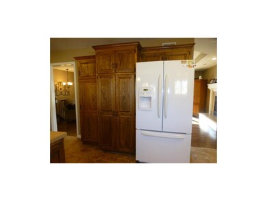 Large pantries with rollouts and pretty updated ti